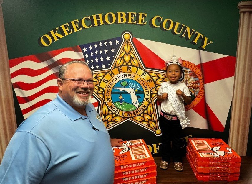 Tiny Miss Okeechobee donates to sheriff's office/